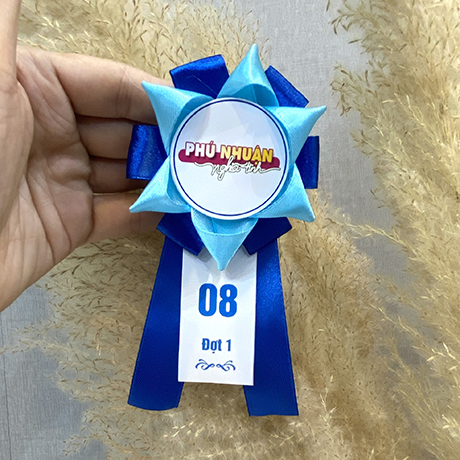Hoa cài áo đại biểu HCM