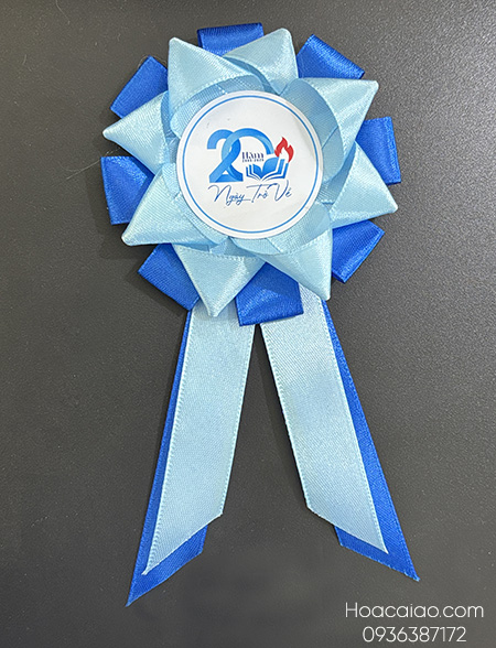 Hoa cài áo kỷ niệm 20 năm ngày trở về