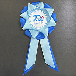 Hoa cài áo kỷ niệm 20 năm ngày trở về